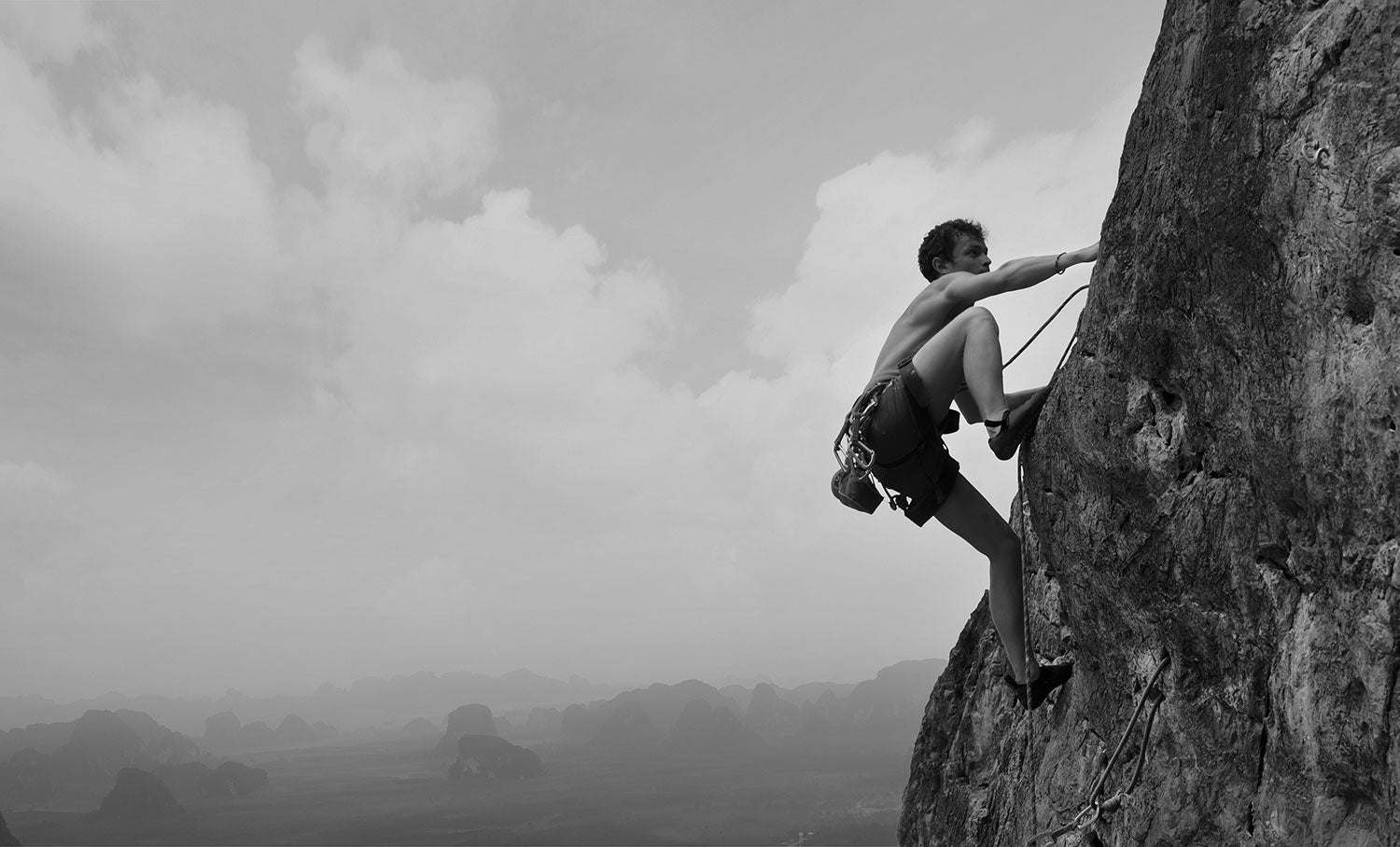 A man climbing a mountain